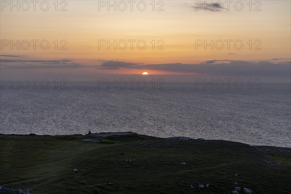 Sunset by the sea