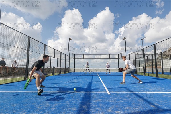 Players in action on a padel court at Kalimera Kriti Resort