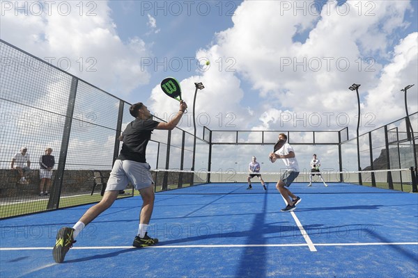 Players in action on a padel court at Kalimera Kriti Resort