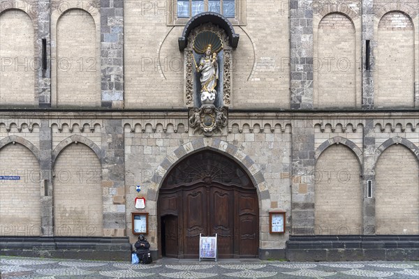 The main portal with the niche figure of Mary on the west façade of the Church of Our Dear Lady
