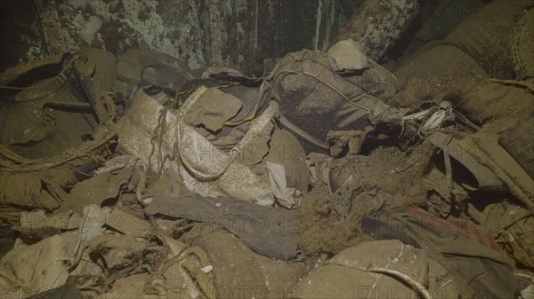 Passengers luggage and personal belongings lie inside hold of ferry Salem Express shipwreck