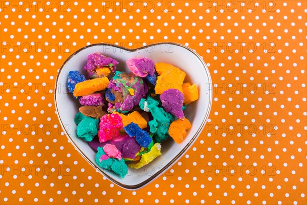 Dry colorful play dough in smal pieces