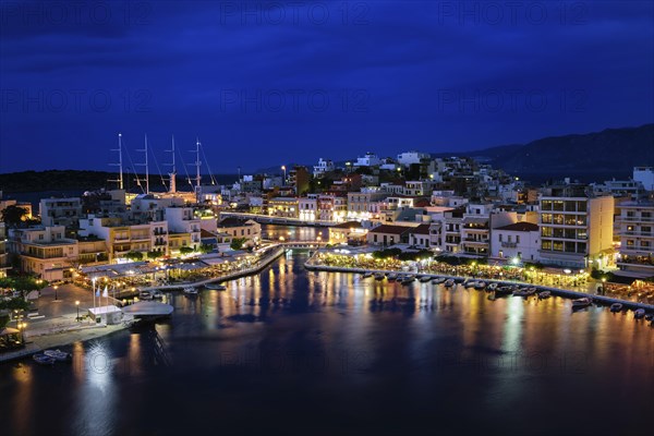 Colorful view of Voulismeni lake and Agios Nikolaos town on Crete island
