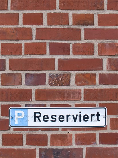 Sign with inscription Reserved