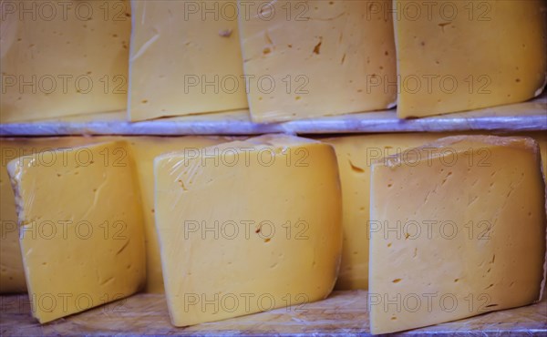 Cuts of kashkaval or kasseri cheese for sale on the shelf