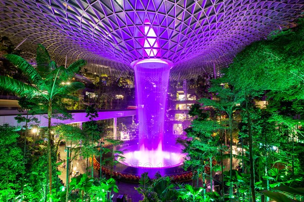 Waterfall at the Jewel Changi Airport shopping centre at the airport in Singapore