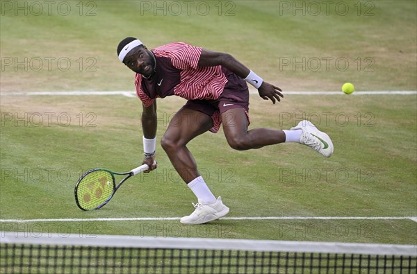 Frances Tiafoe USA converts his match point to win the title