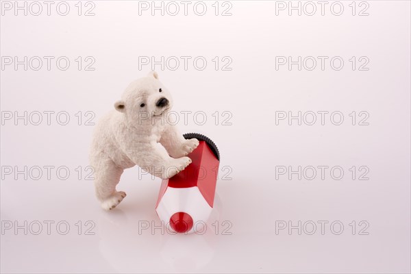 Polar bear on a red pen