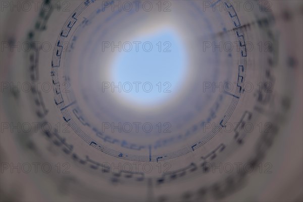 Spiral score forming a circle with a black background
