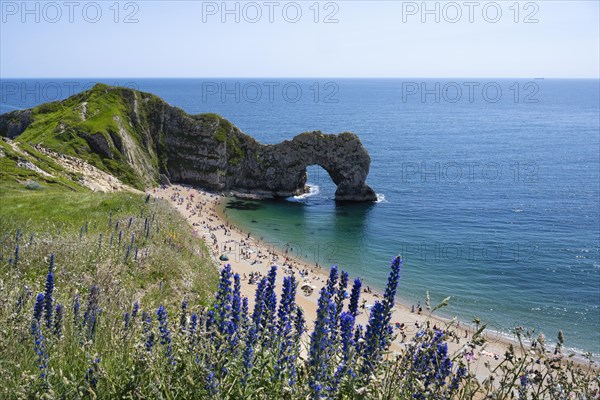 Bathing beach at the famous rock bridge Durdledoor