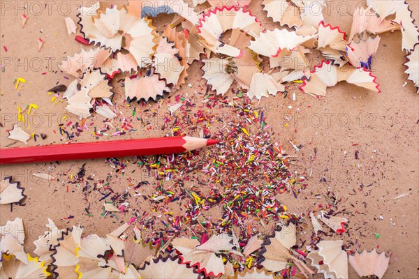 Red Color Pencil over some pencil shavings