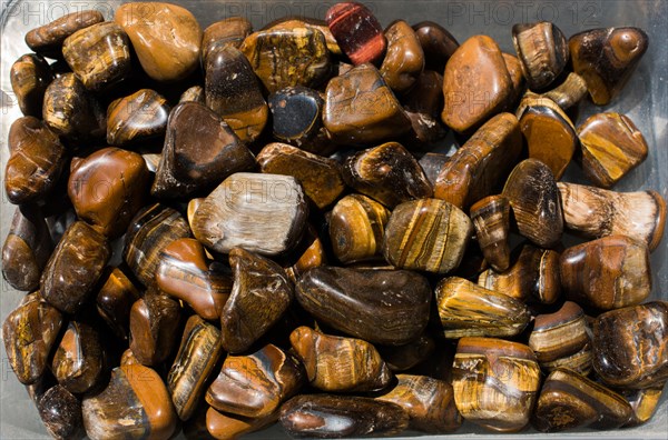 Tiger's eye and hawk's eye gemstone as natural mineral rock specimen