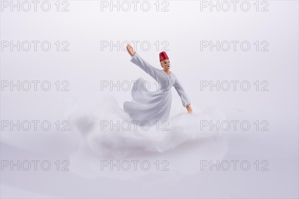 Sufi Dervis on a Cloud on a white background