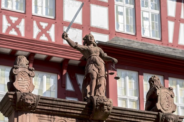 Justitia with scales and sword