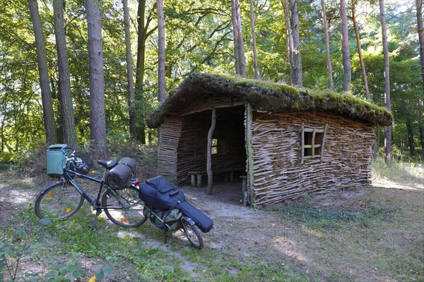Rest hut made of natural materials in the forest
