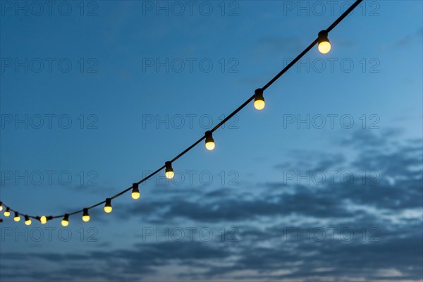 String lights sunset sky