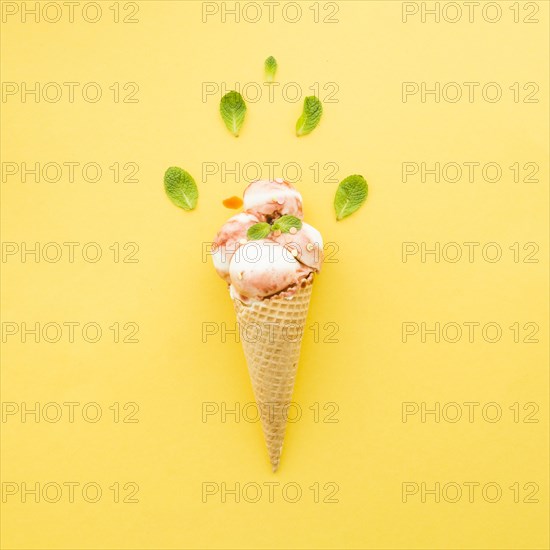 Ice cream waffle cone with syrup mint