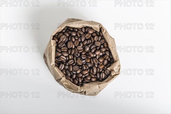 Top view coffee beans paper bag
