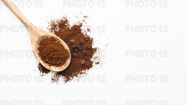 Close up scoop with coffee copy space