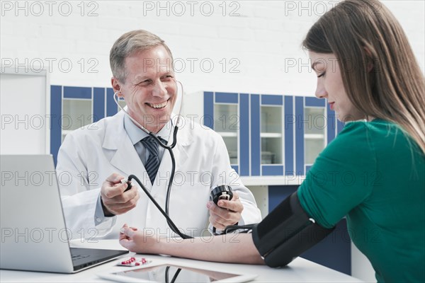 Doctor tending patient