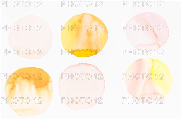 Watercolor circle brushstrokes design white backdrop
