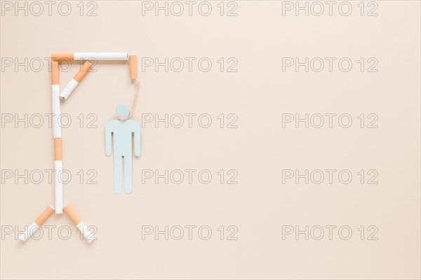 Top view hanging man made by cigarettes