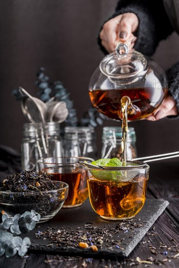 Pouring tea cup