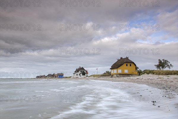 Beach houses along the Baltic Sea on the peninsula Graswarder