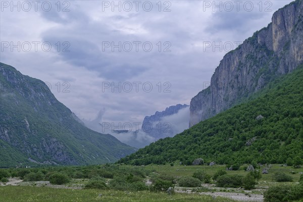 Komarnica Valley in the Dragisnica and Komarnica nature park Park with the mountains of the Durmitor massif and the Dinarides mountain range. Komarnica