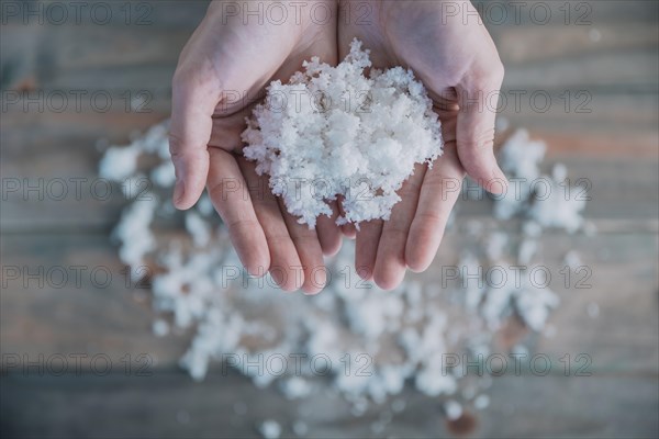 Heap snow hands