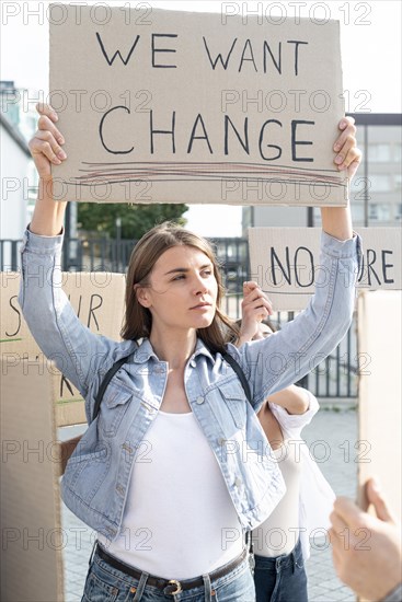 People demonstrating together change