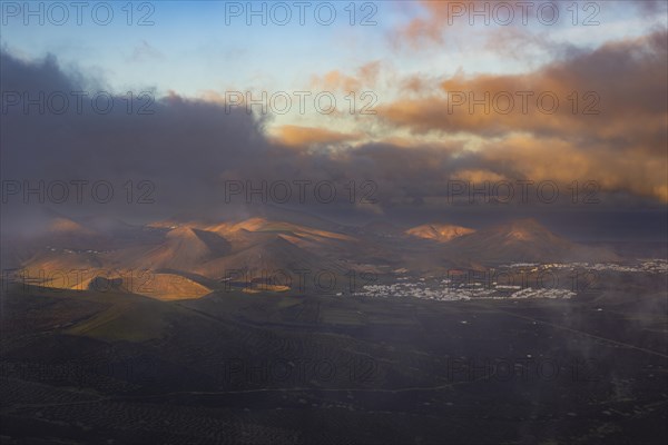 Panorama at sunrise from the Montana de Guardilama to the wine-growing area La Geria