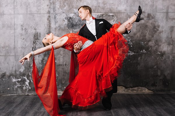 Man holding woman during dance