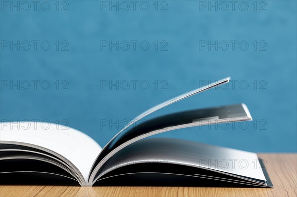 Front view open book wooden table