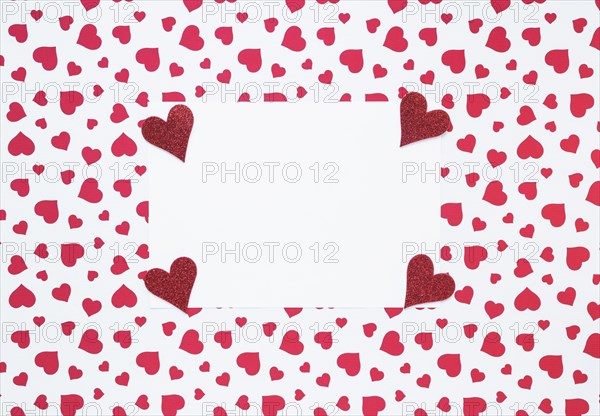 Blank paper with small hearts