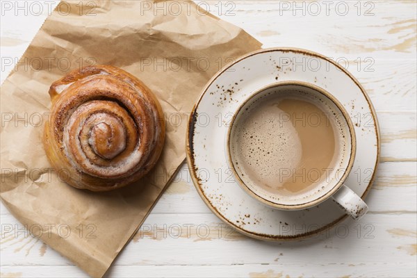 Top view breakfast assortment with coffee pastry