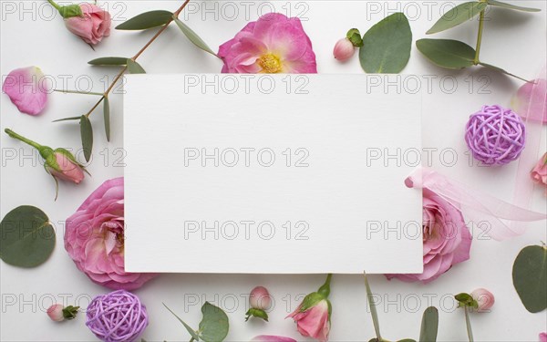 Top view roses flowers paper sheet