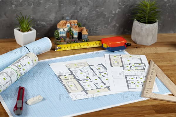 High angle architectural project desk