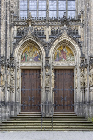 Entrance portal with mosaic at the St Lamberti Catholic Church on Lambertikirchplatz