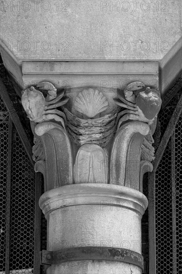 Decorative part of a supporting column with motifs of crabs
