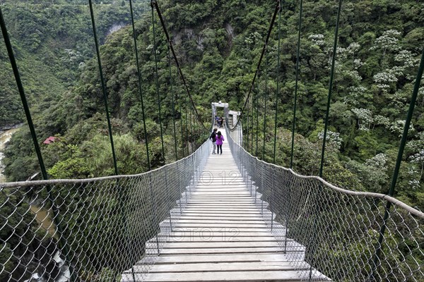 Suspension bridge at the Pailon del Diablo waterfall