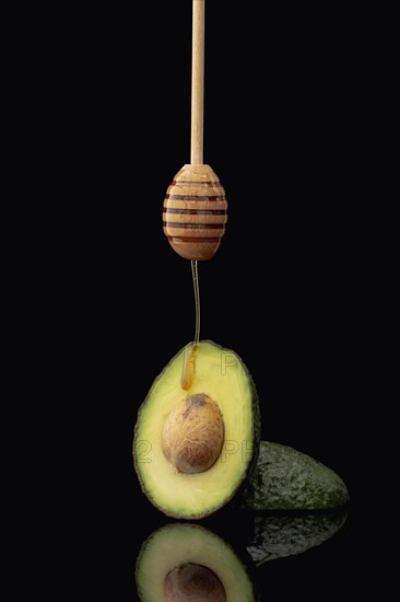 Front view avocado honey dipper