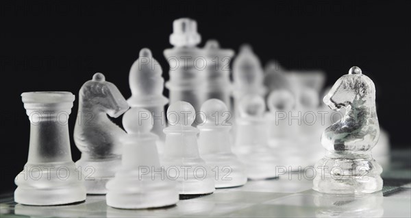 Transparent chess pieces board_3