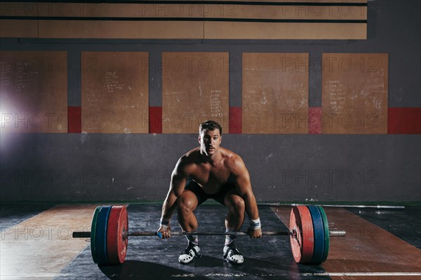 Strong man doing bodybuilding
