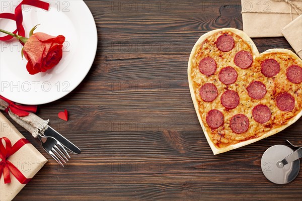 Lovely arrangement valentines day dinner with heart shaped pizza