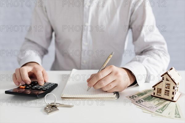 Crop person writing counting