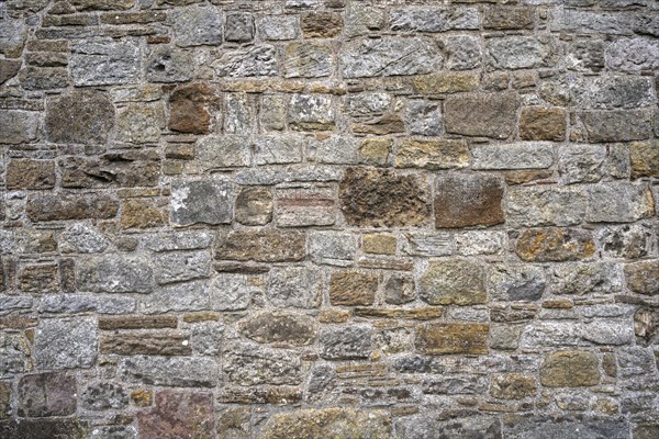 Wall stones made of different types of stone