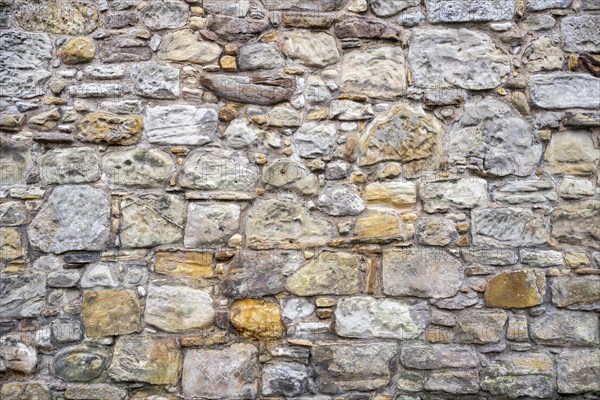 Wall stones made of different types of stone