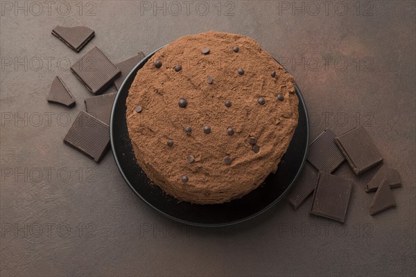 Top view chocolate cake with cocoa powder