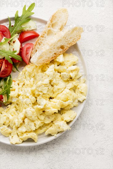 Top view scrambled eggs with copy space